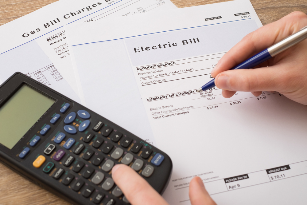 Electric,bill,charges,paper,form,on,the,table